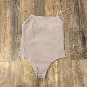glam Sleeveless Spaghetti-Strap Bodysuit in Light Mauve
